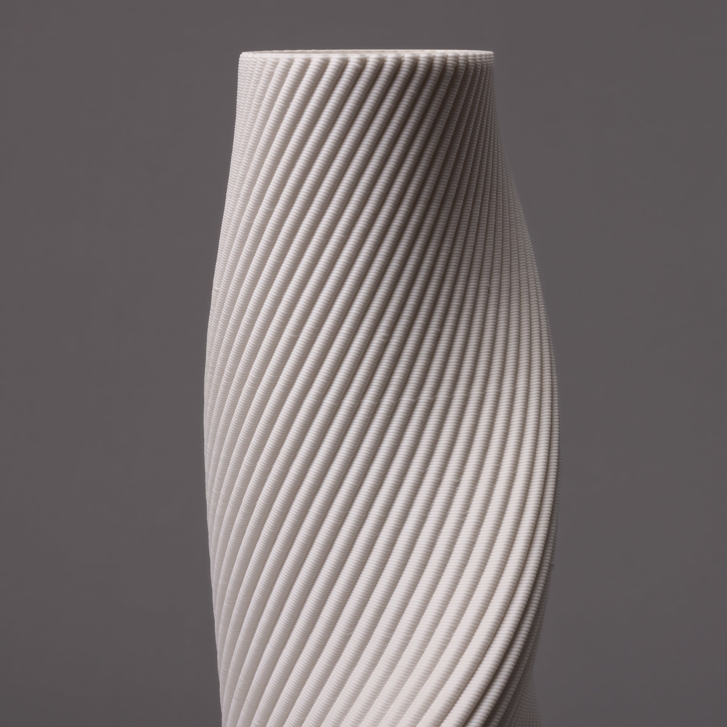 white porcelain tornado sculpture – algorithmic ceramic design