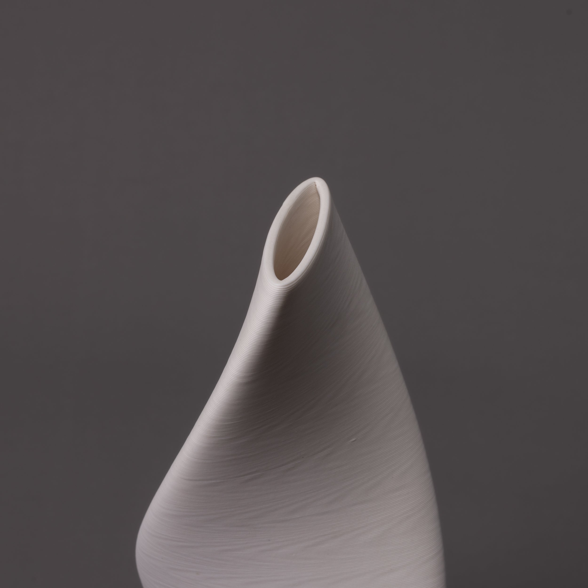 white porcelain tornado sculpture – algorithmic ceramic design