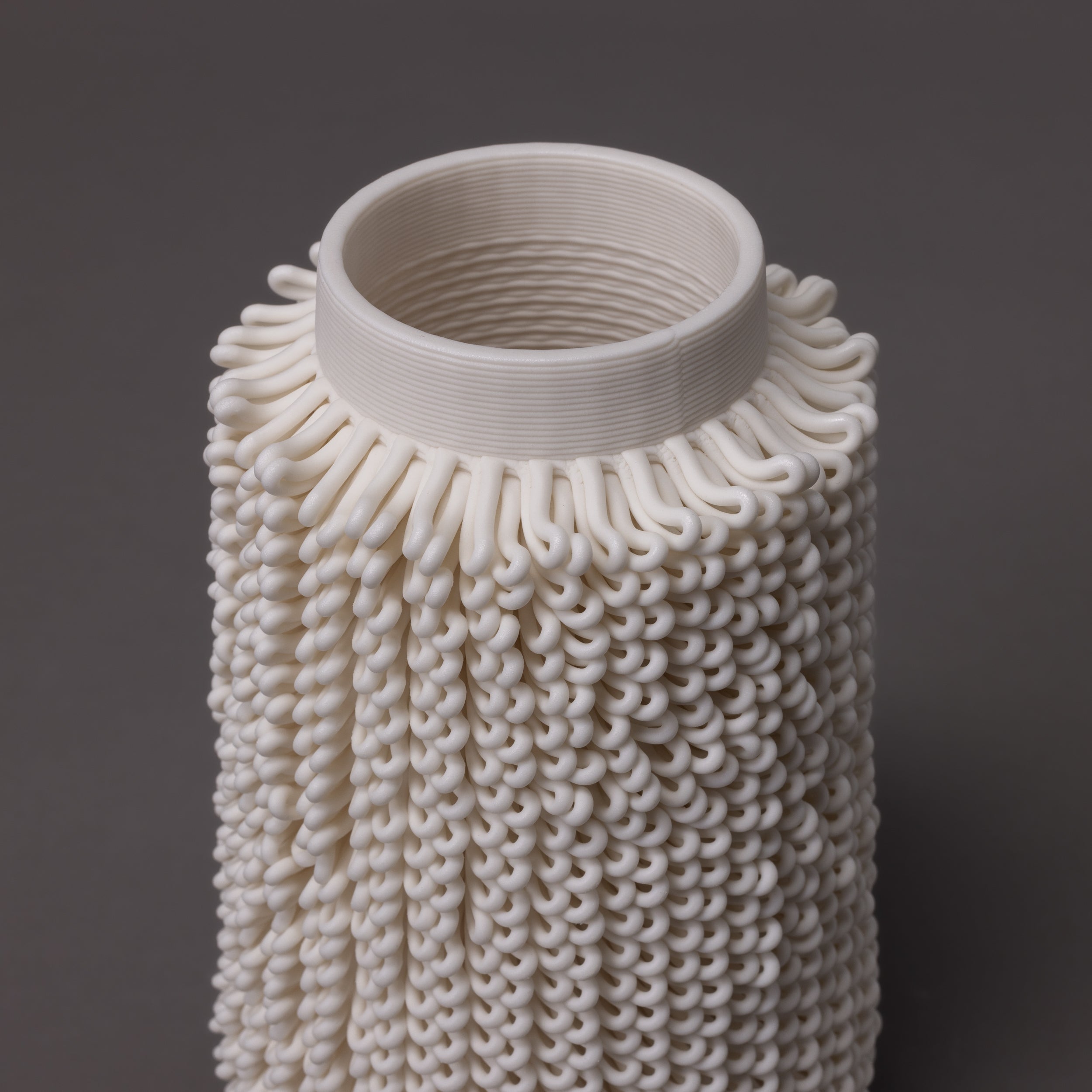 white porcelain dash sculpture – algorithmic ceramic design