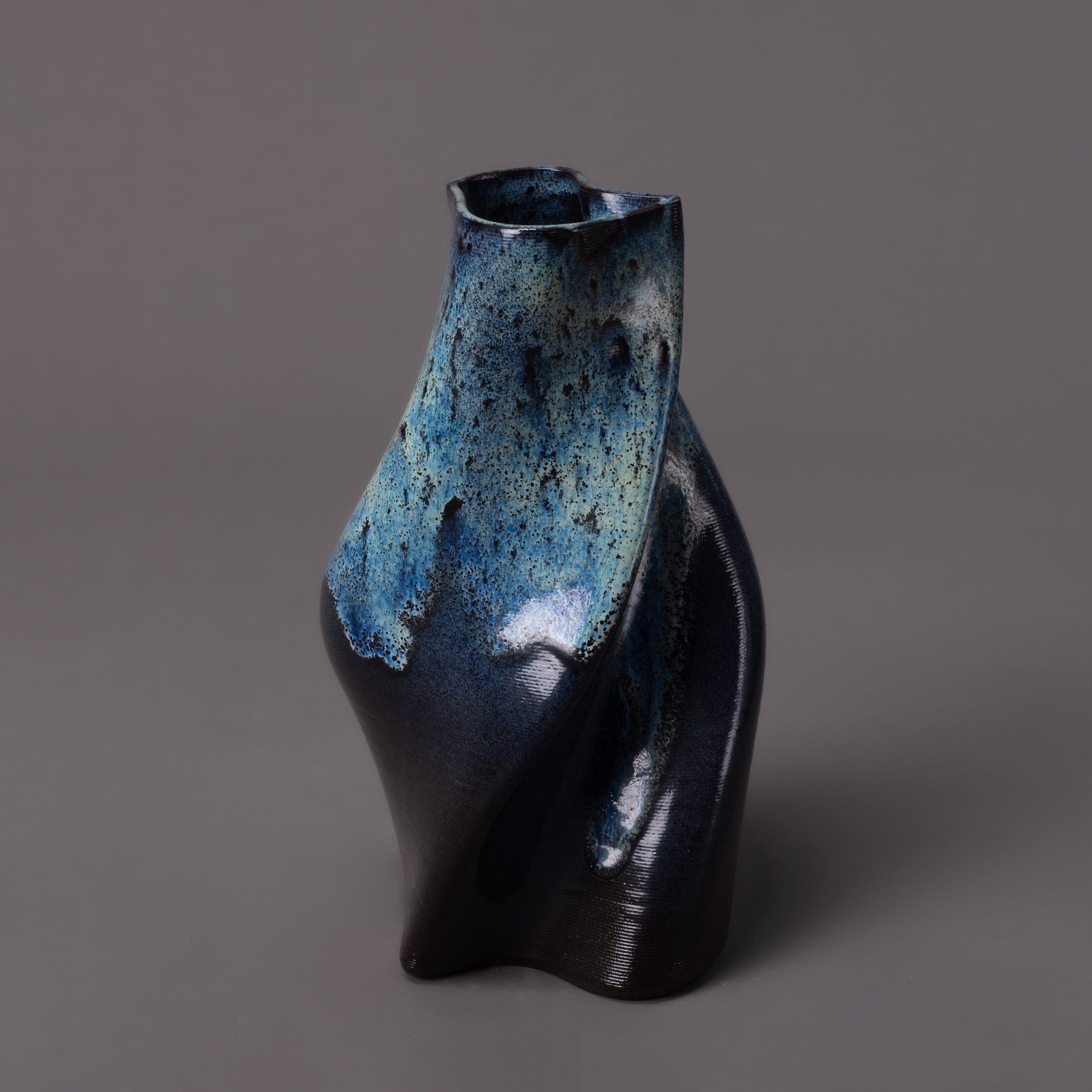 Tornado ceramic sculpture in black clay, glaze effect – BinaryCeramics