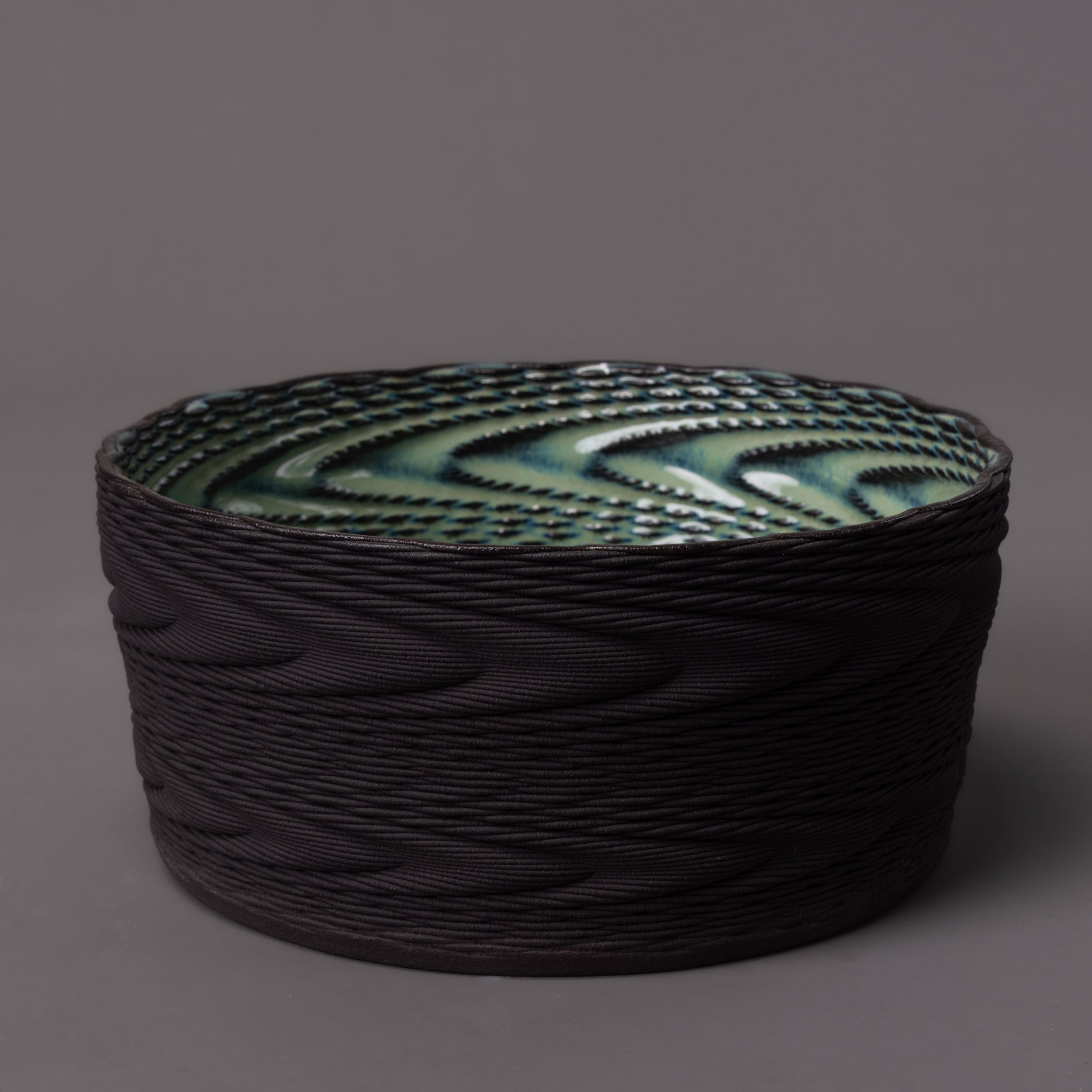 Wave ceramic sculpture in black clay, green glaze – BinaryCeramics