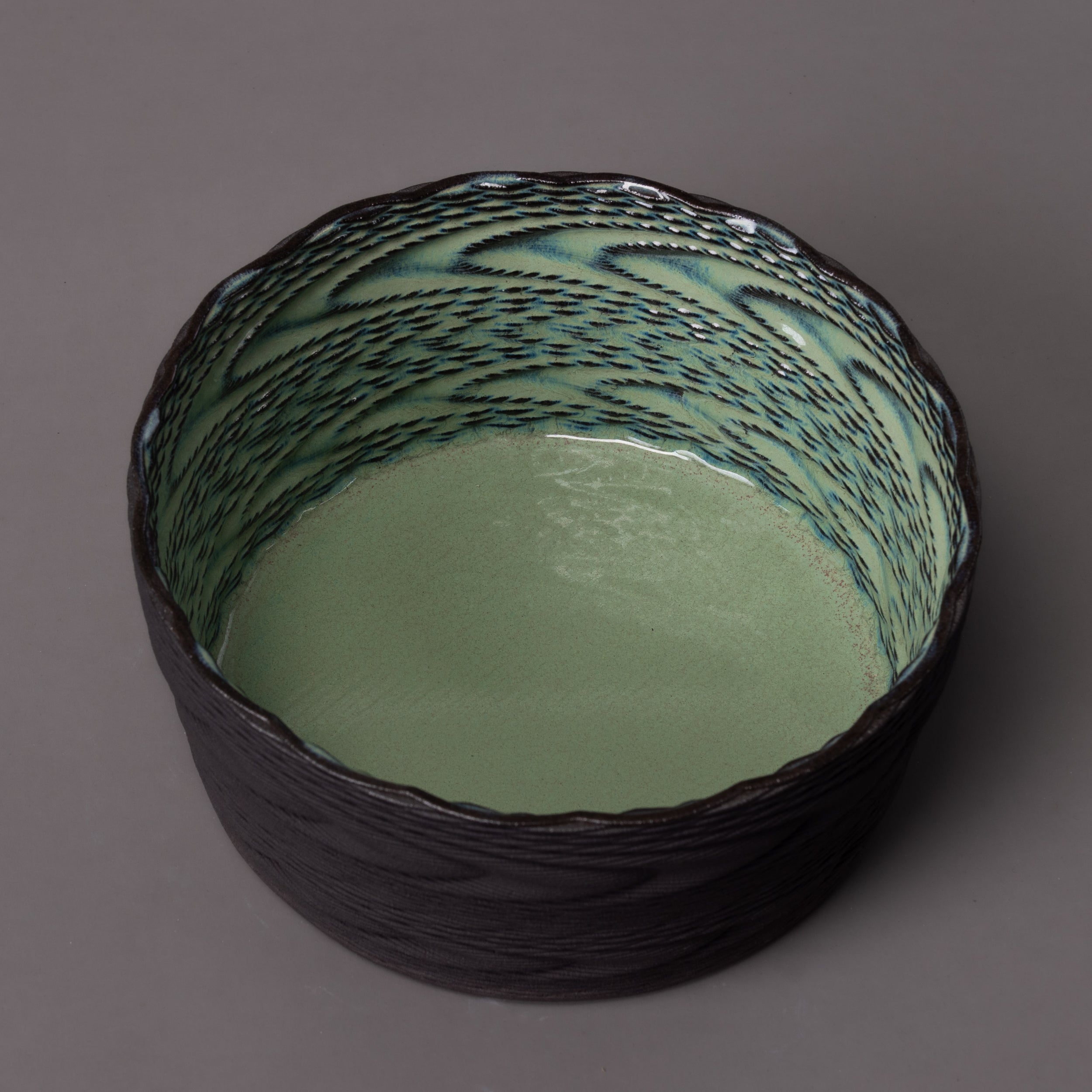 Wave ceramic art – black clay, green glaze – BinaryCeramics Greece