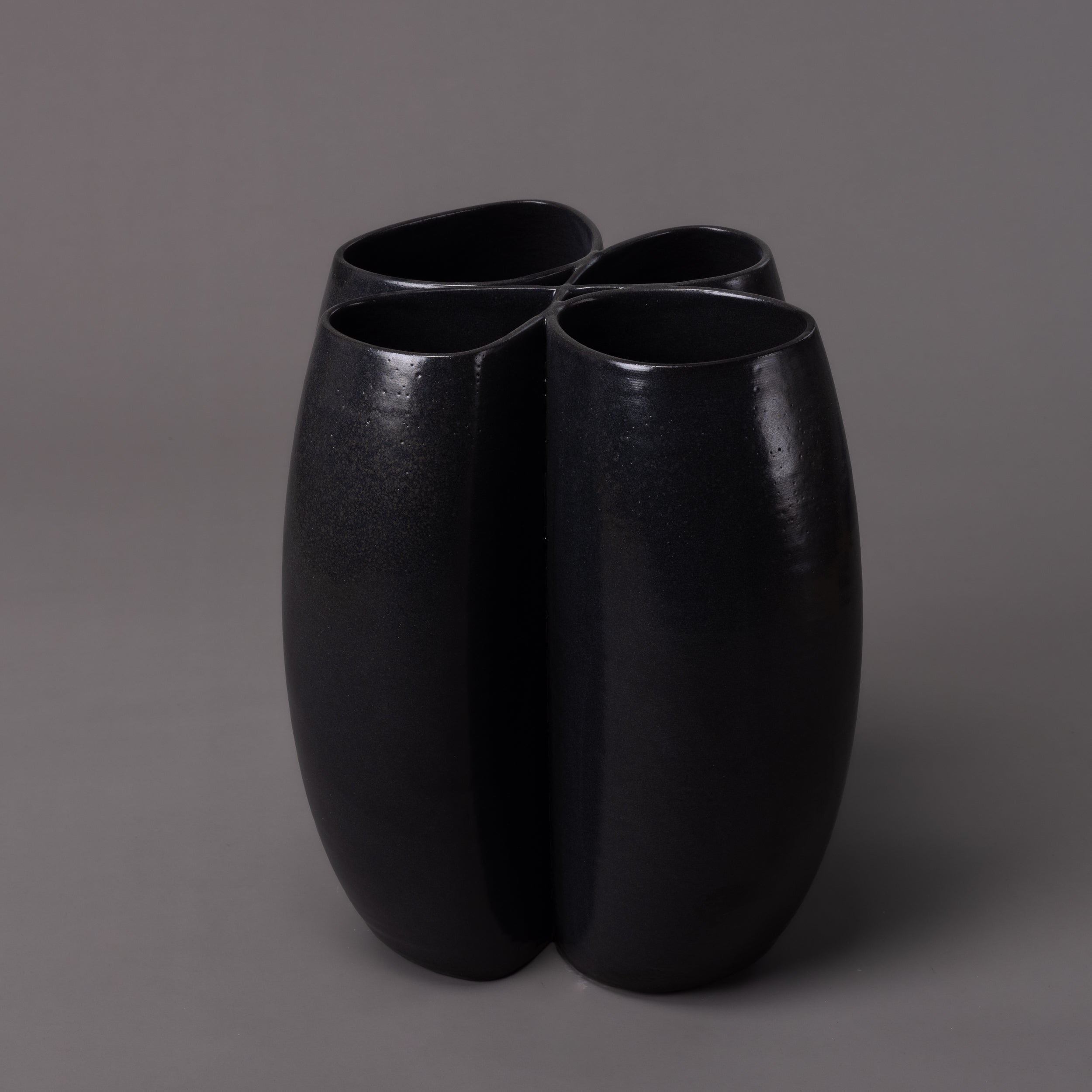 Intersect ceramic sculpture in ceramic, black glaze – BinaryCeramics