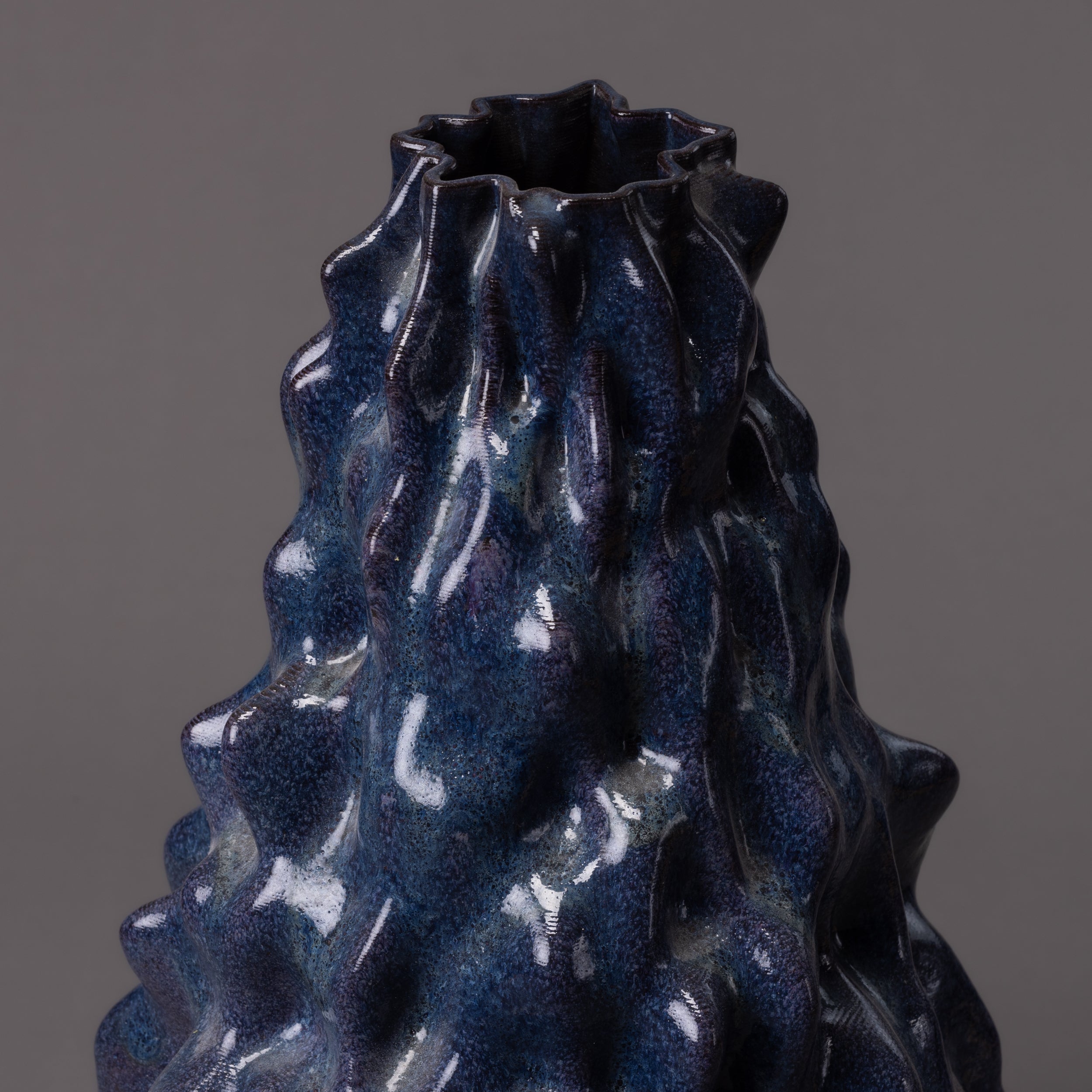 Alien sculpture – black clay, blue glaze – BinaryCeramics, Athens