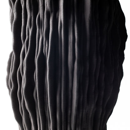 Digitally fabricated ceramic piece from the Frequency collection, inspired by sound wave patterns and rhythmic surface design