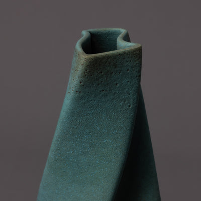 black clay, green glaze tornado sculpture – algorithmic ceramic design
