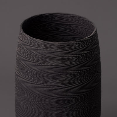 black clay wave sculpture – algorithmic ceramic design