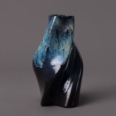 black clay, glaze effect tornado sculpture – algorithmic ceramic design