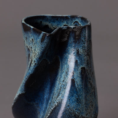 3D-printed tornado sculpture in black clay, glaze effect – BinaryCeramics