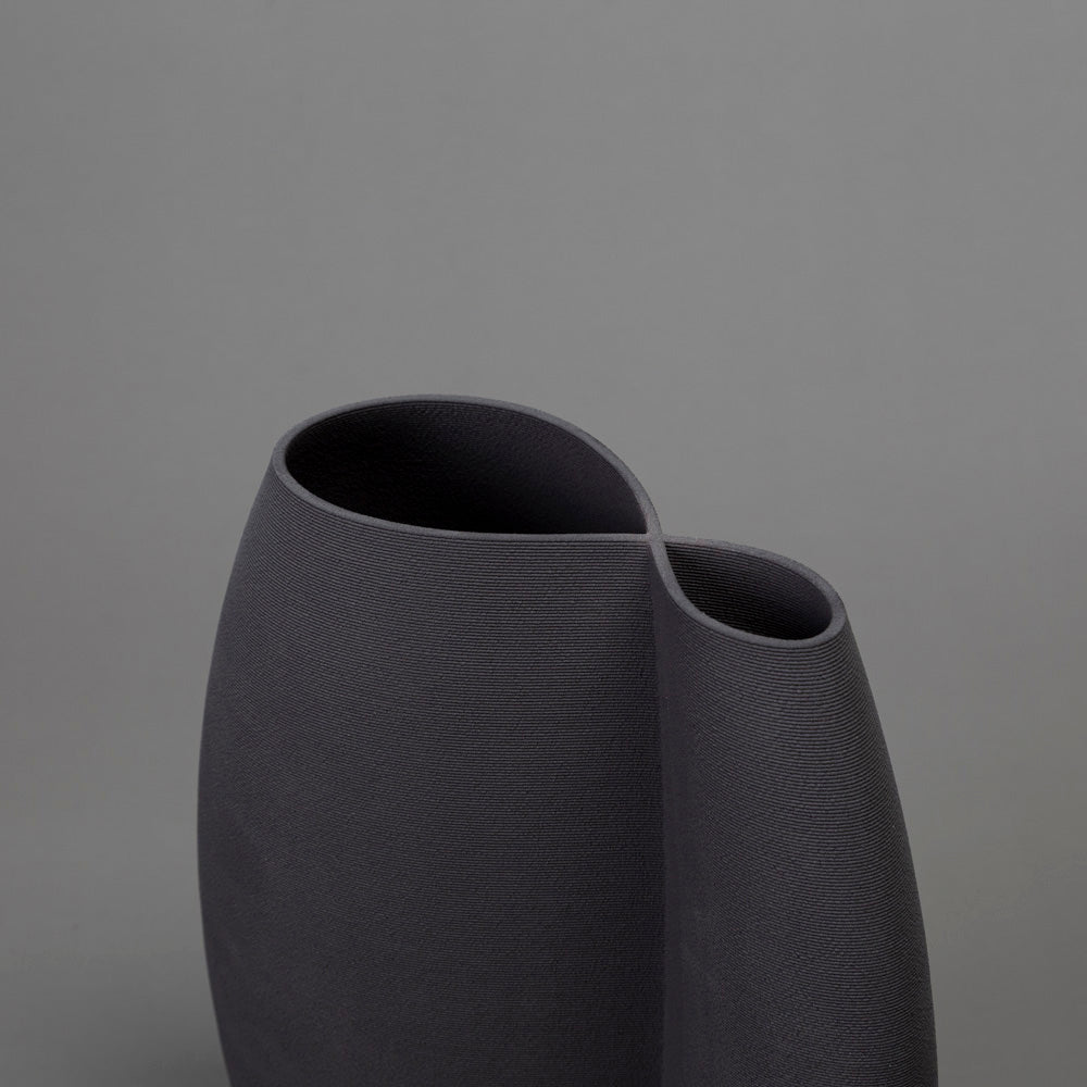 black clay intersect sculpture – algorithmic ceramic design