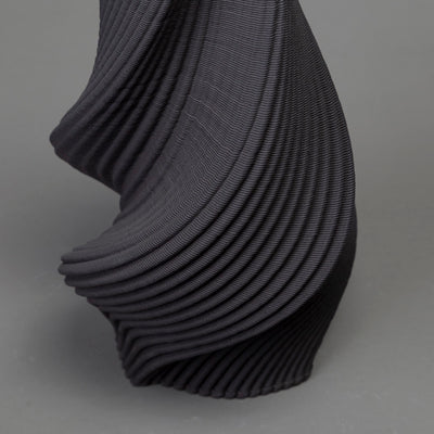 3D-printed tornado form in black clay – BinaryCeramics