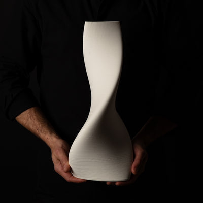 T-1001 Tornado Ceramic Sculpture – White Porcelain – artist holding – BinaryCeramics Athens