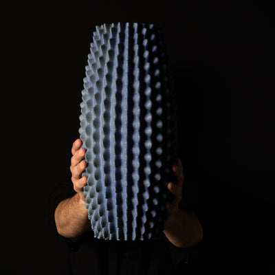 C-0001 Cactus Organic Form – Black Clay Blue Glaze – artist holding – BinaryCeramics Athens