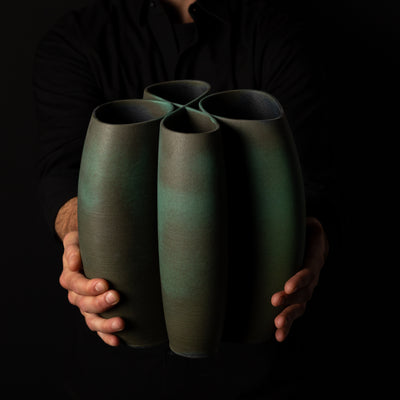 I-0010 Intersect Continuous-Line Sculpture – Green Glaze – artist holding – BinaryCeramics Athens