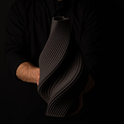 T-1000 Tornado Ceramic Form – Black Clay – artist holding – BinaryCeramics Athens